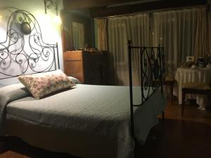 Postel nebo postele na pokoji v ubytování Suite Attico con Altana