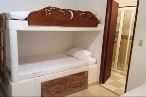 Postel nebo postele na pokoji v ubytování PLAYA BLANCA SANANTERO CORDOBA las palmeras D’JC