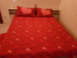 Łóżko lub łóżka w pokoju w obiekcie Grado centro