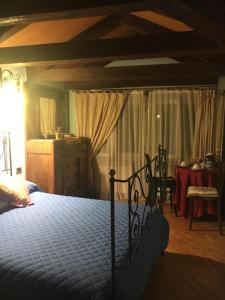 Postel nebo postele na pokoji v ubytování Suite Attico con Altana