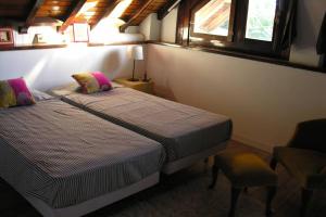 Postel nebo postele na pokoji v ubytování CasaBonaventura - House near Etna