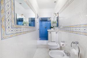 Een badkamer bij Villa Maresca B&B