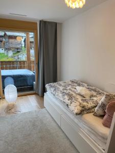 Postel nebo postele na pokoji v ubytování Residenz Panorama - Blatten bei Naters VS + 37 fotografií