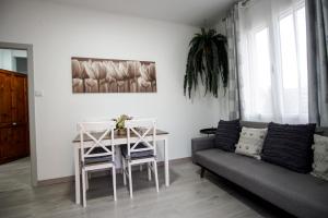 a living room with a couch and a table at Casa Vera in Roquetas