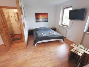 Giường trong phòng chung tại 25qm Appartment AUGUSTE