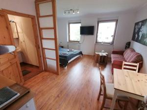 TV/trung tâm giải trí tại 25qm Appartment AUGUSTE