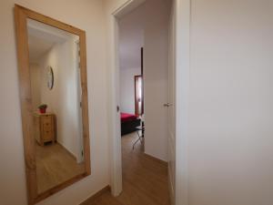 Łóżko lub łóżka w pokoju w obiekcie Petite Maison, La Laguna