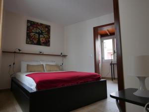 Łóżko lub łóżka w pokoju w obiekcie Petite Maison, La Laguna