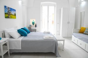 Postel nebo postele na pokoji v ubytování B&B Benefici