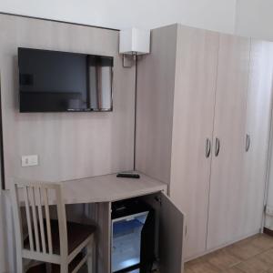 Kuchyň nebo kuchyňský kout v ubytování Hotel Caesar