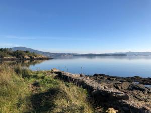 a view of a large body of water at Casa Rural Manuela in As Mirans