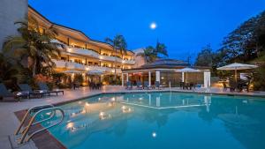 a large swimming pool in front of a building at The Encinitan Hotel & Suites in Encinitas