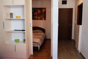 a bedroom with a bed in a room at Apartman Svetogorska in Zlatibor