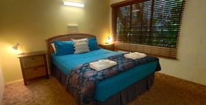 Cama o camas de una habitación en Daintree Rainforest Retreat Motel