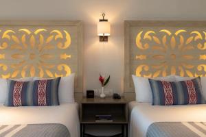 A bed or beds in a room at Pueblo Bonito Mazatlan Beach Resort - All Inclusive