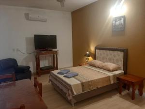 A bed or beds in a room at La Esperanza