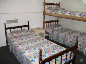 Poschodová posteľ alebo postele v izbe v ubytovaní Hotel Hangar
