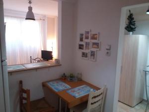 a small kitchen with a table and a sink at Nice apartments in the center of Athens! in Athens