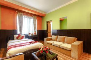 Postel nebo postele na pokoji v ubytování Nepalaya Hotel