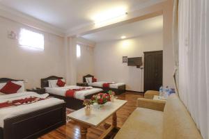 Postel nebo postele na pokoji v ubytování Nepalaya Hotel + 37 fotografií