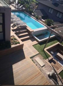 an overhead view of a swimming pool in a yard at Luxe Life House in Durban