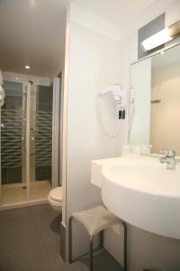 Un baño de Hotel du Louvre