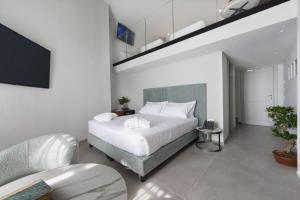 Voodi või voodid majutusasutuse Grand Hotel San Gemini I UNA Esperienze toas