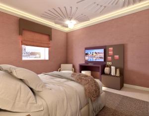 1 dormitorio con 1 cama y TV de pantalla plana en Happy House Comfort Plus, en Faro