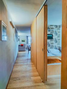 Posteľ alebo postele v izbe v ubytovaní Apartments Cafe Hexe