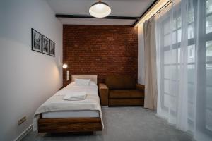 Postel nebo postele na pokoji v ubytování Garni Hotel DOCK Bratislava