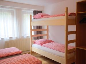 Voodi või voodid majutusasutuse Waldhaus Talblick toas