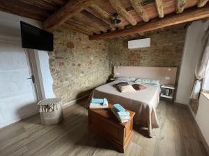 Postel nebo postele na pokoji v ubytování B&B IL VOLO