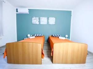 Postel nebo postele na pokoji v ubytování Apartment Barolinke