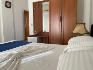 Voodi või voodid majutusasutuse Hotel Benilva toas