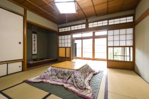 Una cama o camas en una habitación de 清浄心院