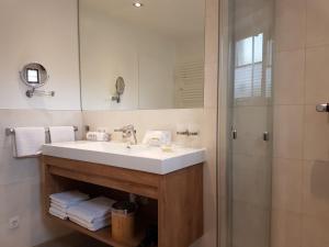 Kúpeľňa v ubytovaní Appartements Haus Olympia