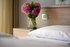 Eco Hotel Ariston客房内的一张或多张床位