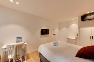 Ένα ή περισσότερα κρεβάτια σε δωμάτιο στο La Caravelle - Modern apartment 2 steps from downtown Annecy