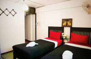 Postel nebo postele na pokoji v ubytování Lanna Hostel