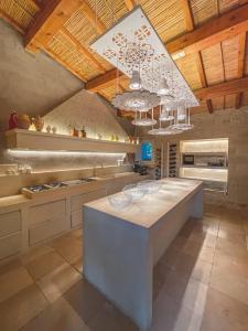 Kuchyň nebo kuchyňský kout v ubytování Relais Masseria Capasa