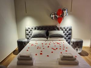 Ліжко або ліжка в номері Corte Trento - Exclusive Rooms