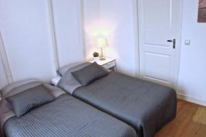 Ένα ή περισσότερα κρεβάτια σε δωμάτιο στο Stylish Canalhouse B +14 φωτογραφίες