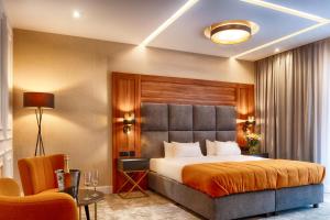 Posteľ alebo postele v izbe v ubytovaní Grand Focus Hotel Szczecin