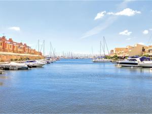 a group of boats are docked in a harbor at Apartment Les Méridiennes by Interhome in Gruissan