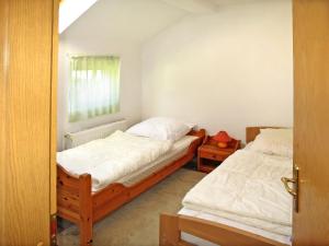 Cama ou camas em um quarto em Holiday Home Altes Schöpfwerk-3 by Interhome