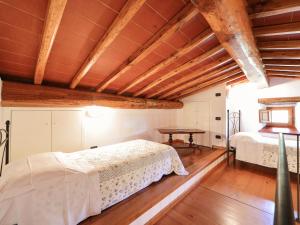 Postel nebo postele na pokoji v ubytování Holiday Home Torsoli by Interhome