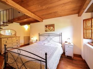 Postel nebo postele na pokoji v ubytování Holiday Home Torsoli by Interhome