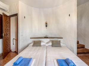 A bed or beds in a room at Holiday Home Toscamolino by Interhome