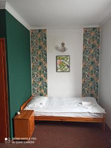 Tempat tidur dalam kamar di Hostel Los Amigos