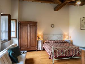 Posteľ alebo postele v izbe v ubytovaní Holiday Home Casale il Giglio-1 by Interhome